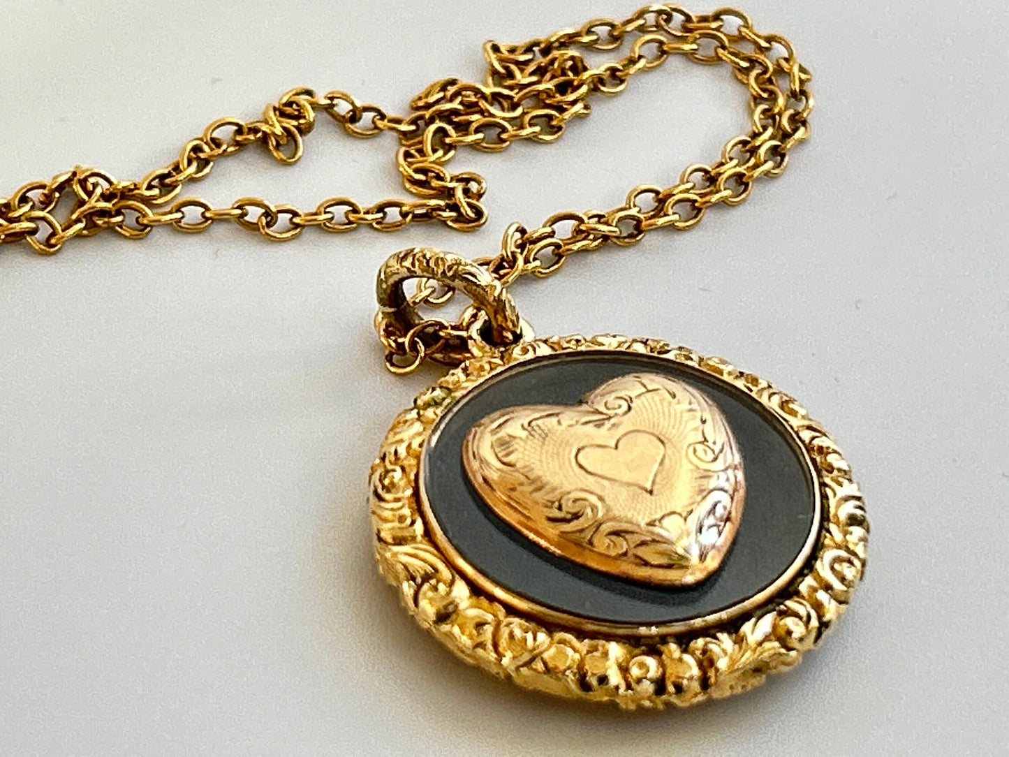 Antique 14k Gold Victorian Mourning Necklace with a heart motif.