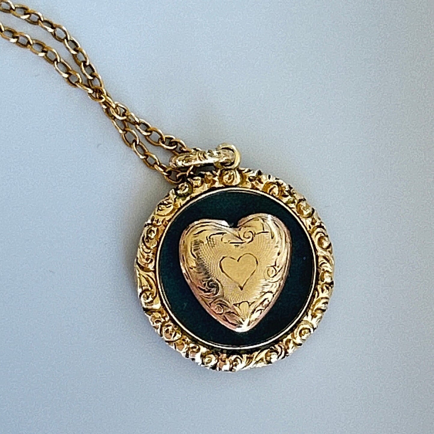 Antique 14k Gold Victorian Mourning Necklace with a heart motif.