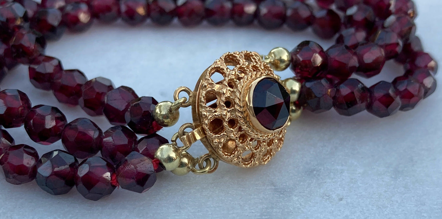 Antique Victorian three strand Rose Cut Garnet Bracelet with 15k Gold closure.