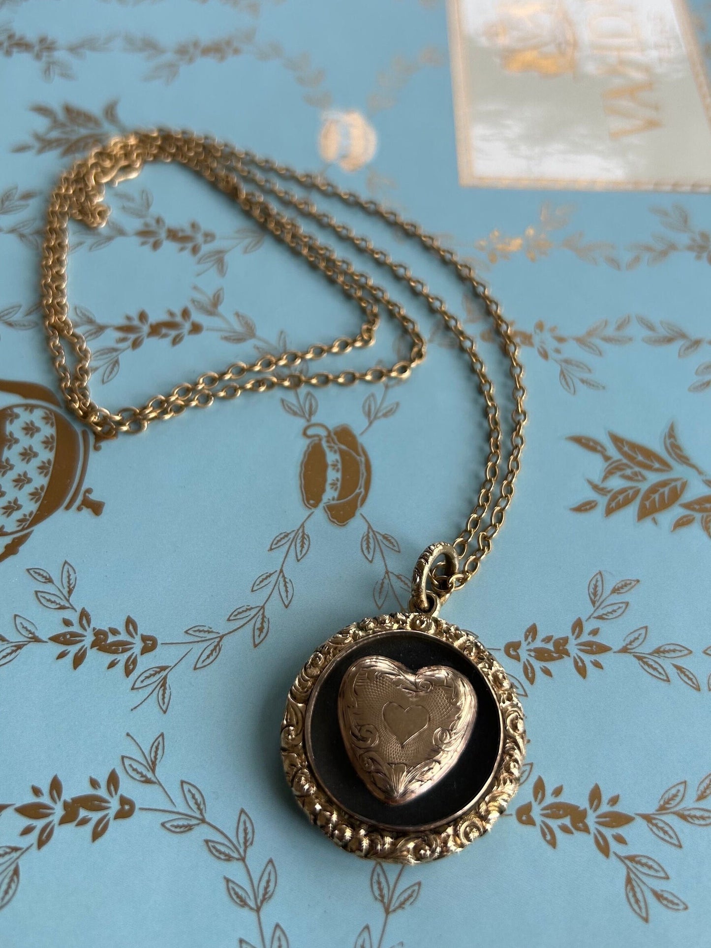 Antique 14k Gold Victorian Mourning Necklace with a heart motif.