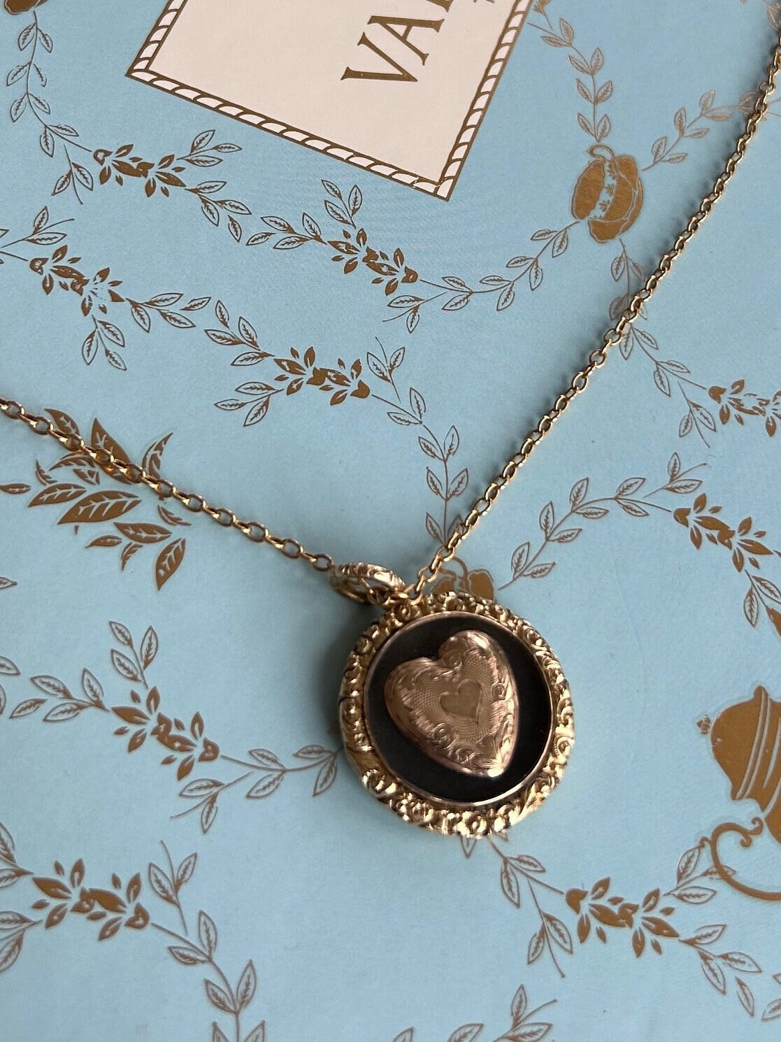 Antique 14k Gold Victorian Mourning Necklace with a heart motif.